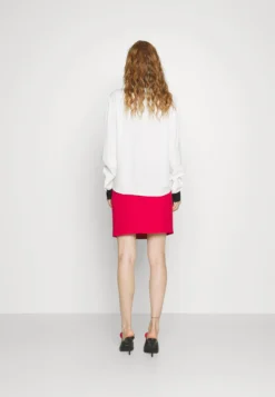 MOSCHINO Punk Buttons - Mini Skirt -Esprid Shop 19070632ed4e467bac835db1b35fe268 scaled