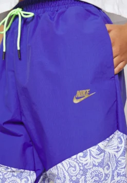 Nike Sportswear Pant - Tracksuit Bottoms - Lapis/Gold -Esprid Shop 879f63d1152844bea0746fe7f4ab629a scaled